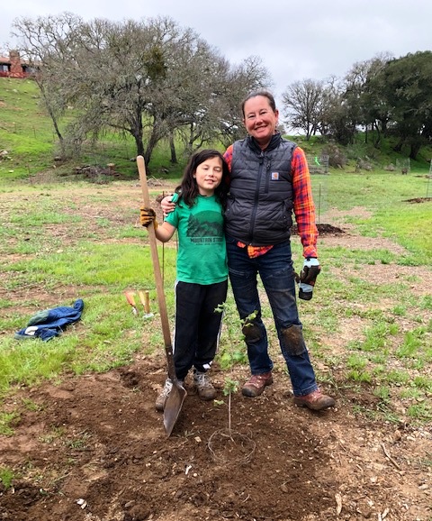 Rhys and Zarah finished planting a new oak tree!